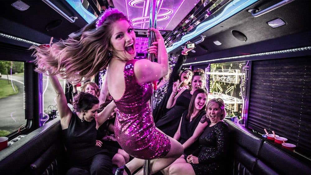 Guest dancing on the luxury party bus